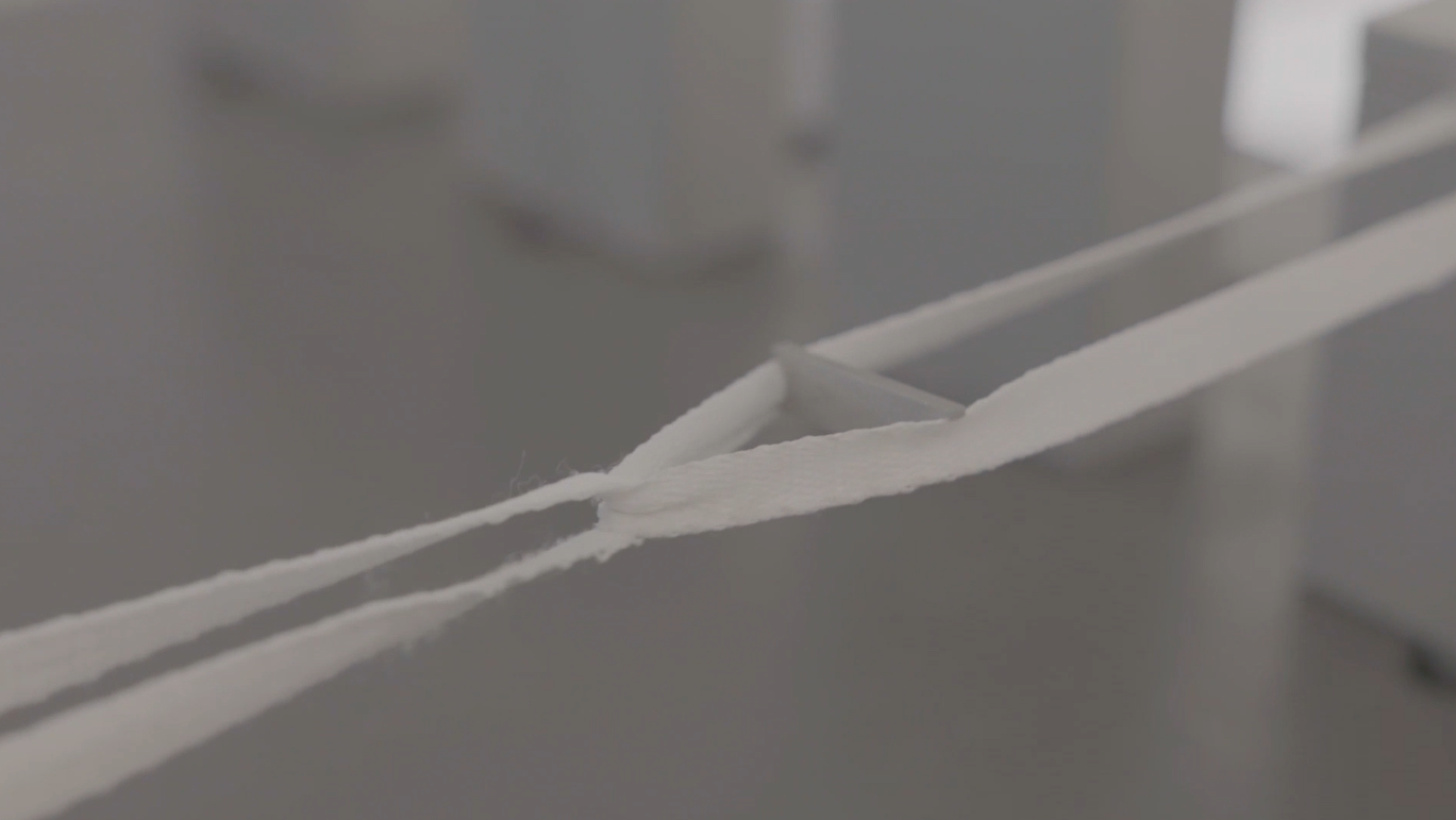 A shoelace abrasion tester