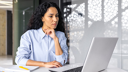 person engaged with laptop