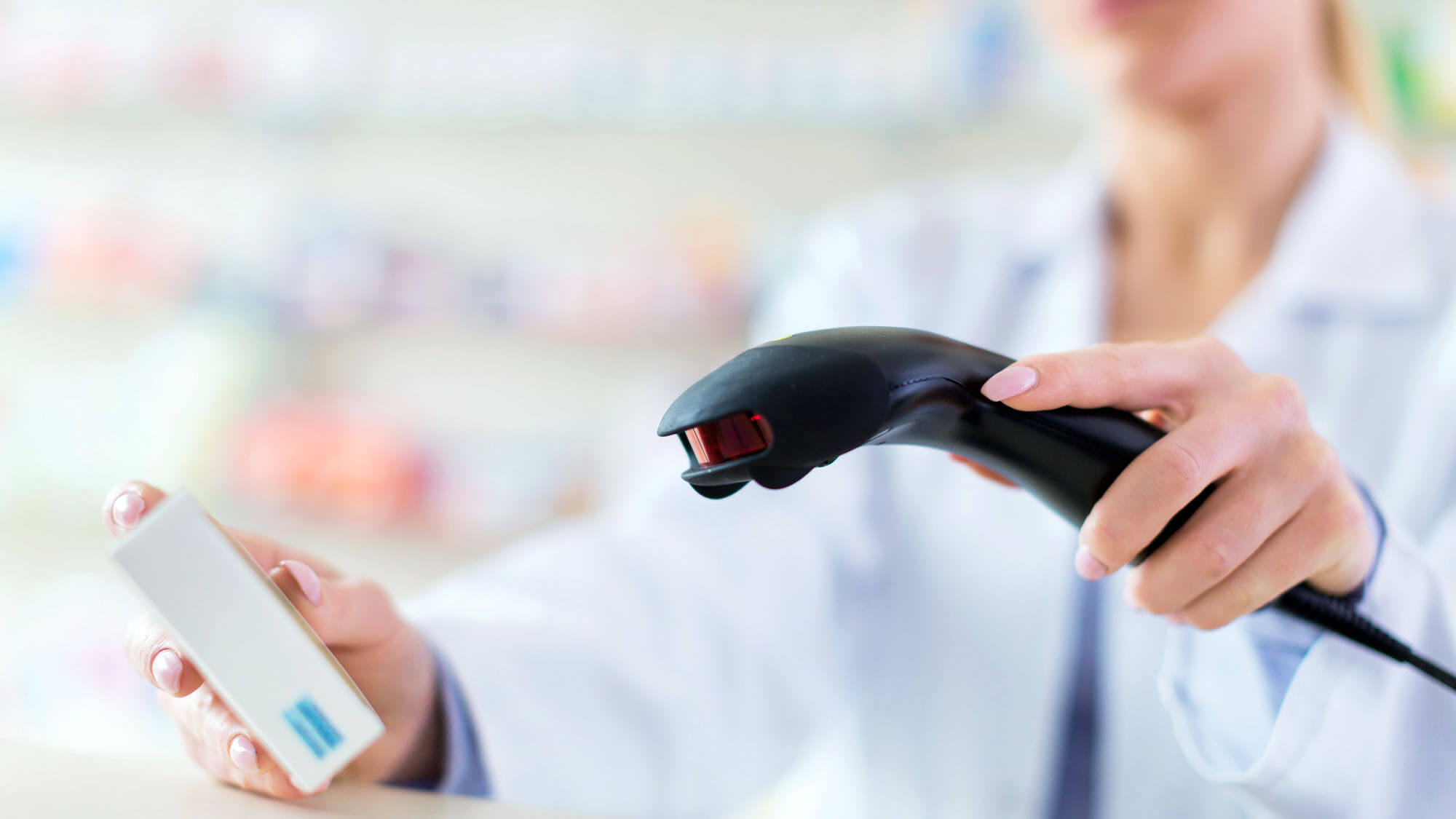 Pharmacist scanning product