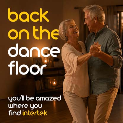 An older couple dancing in their home