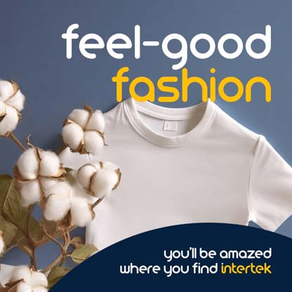 White t-shirt next to cotton blooms